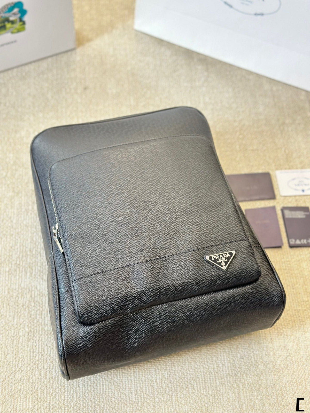 FRONT ZIP POCKET BACKPACK 38 IN BLACK GRAINED CALFSKIN